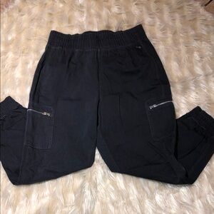 black cargo jogger pants with zippered pockets